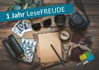 Cover des Büchereiausweises mit Geschenkmotiv und Aufschrift 1 Jahr Lesefreude