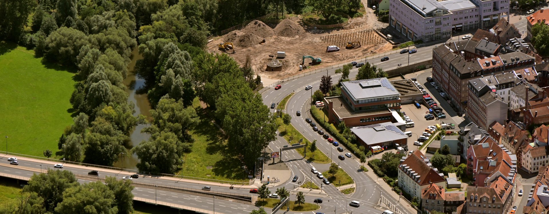 Baustelle HSG und Henri-Dunant-Straße aus der Luft, rechts oben Sozialrathaus